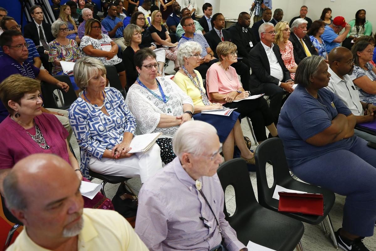 Dozens of people attended a special meeting of the Board of Education to vote on a tax increase to pay for school safety upgrades at the Fayette County Public Schools Central Office in 2018 in Lexington.