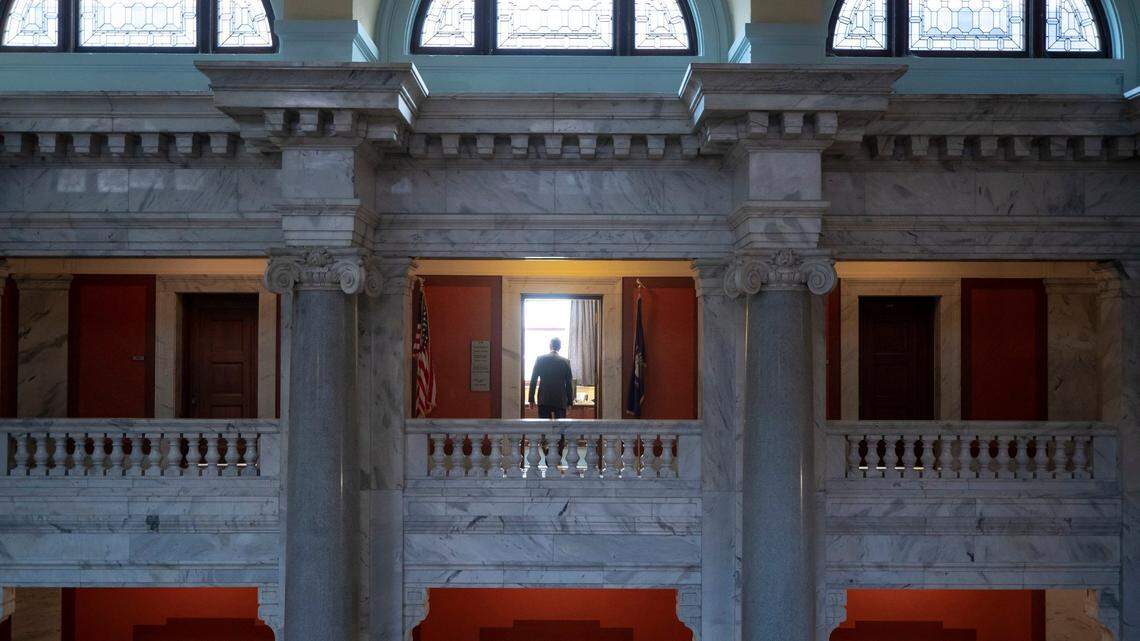A Kentucky state senator walks into an office at the Kentucky state Capitol on Friday, Aug. 26, 2022.
