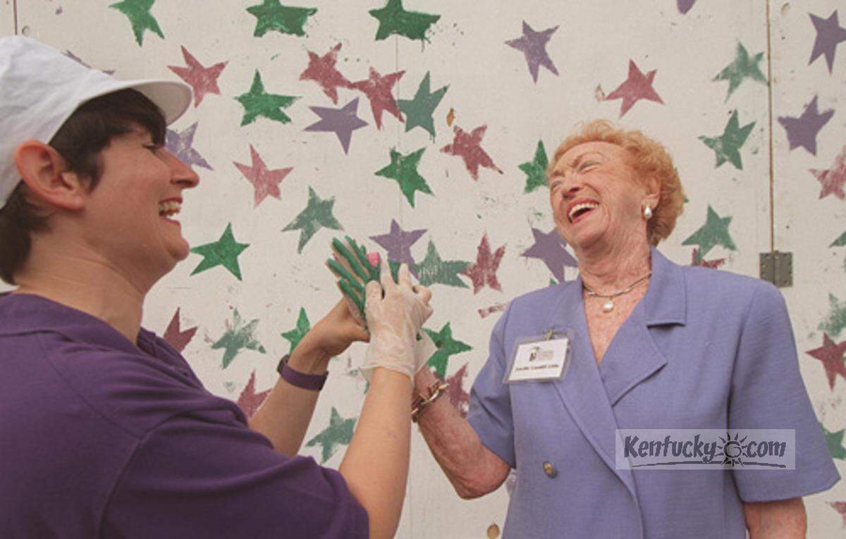 Lexington Children’s Theatre artistic director Vivian Snipes shared a laugh with Lucille Caudill Little at a 1997 event that was a prelude to the construction of the the theater’s Short Street facility. © Lexington Herald-Leader photo by Rob Sumner.