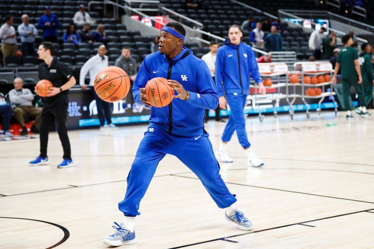 Oscar Tshiebwe goes through warmups in Kentucky attire prior to the game against Michigan State at Gainbridge Fieldhouse in Indianapolis, In., Tuesday, November 15, 2022.