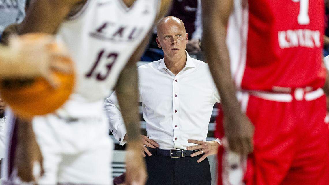 Eastern Kentucky basketball coach A.W. Hamilton looks on from the sideline during Monday’s loss to Western Kentucky.