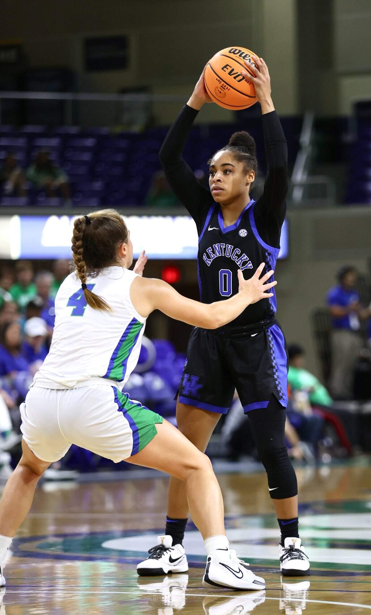 Kentucky guard Brooklyn Miles looks to make a pass against Florida Gulf Coast.