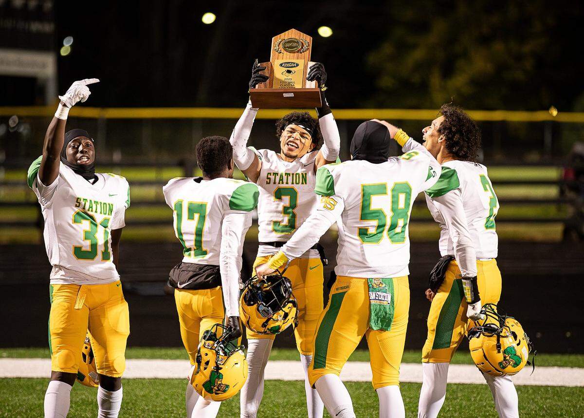 Bryan Station wide receiver JT Haskins (3) celebrates with his teammates after the Defenders defeated Ballard 24-21 in the Class 6A state semifinals on Friday night. The Defenders will play Trinity for the state championship at Kroger Field on Dec. 2.