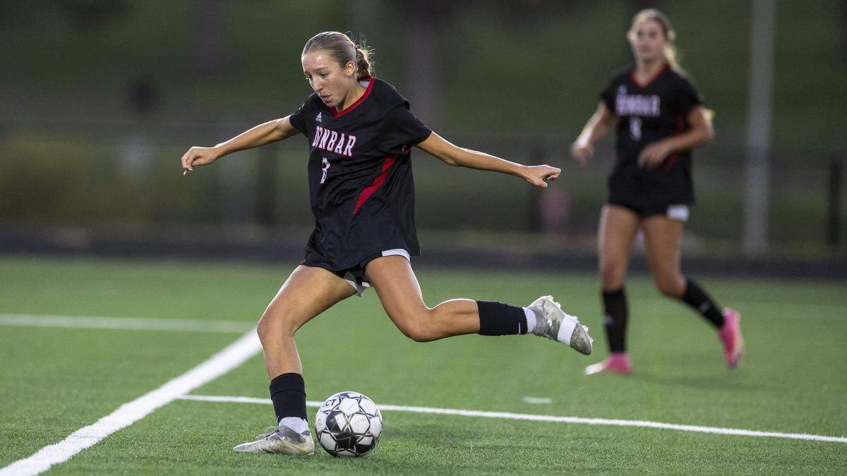 Paul Laurence Dunbar's Emerson Stone (8) shoots on goal during the 11th Region girls' soccer semifinals Thursday, Oct. 16, 2025 at Scott County High School in Georgetown, Ky.
