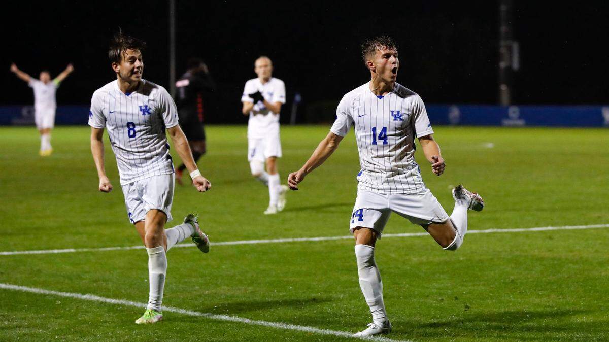 Kentucky ‘s Max Miller (14) celebrates scoring the tying goal against Dayton on Wednesday night at Bell Soccer Complex.