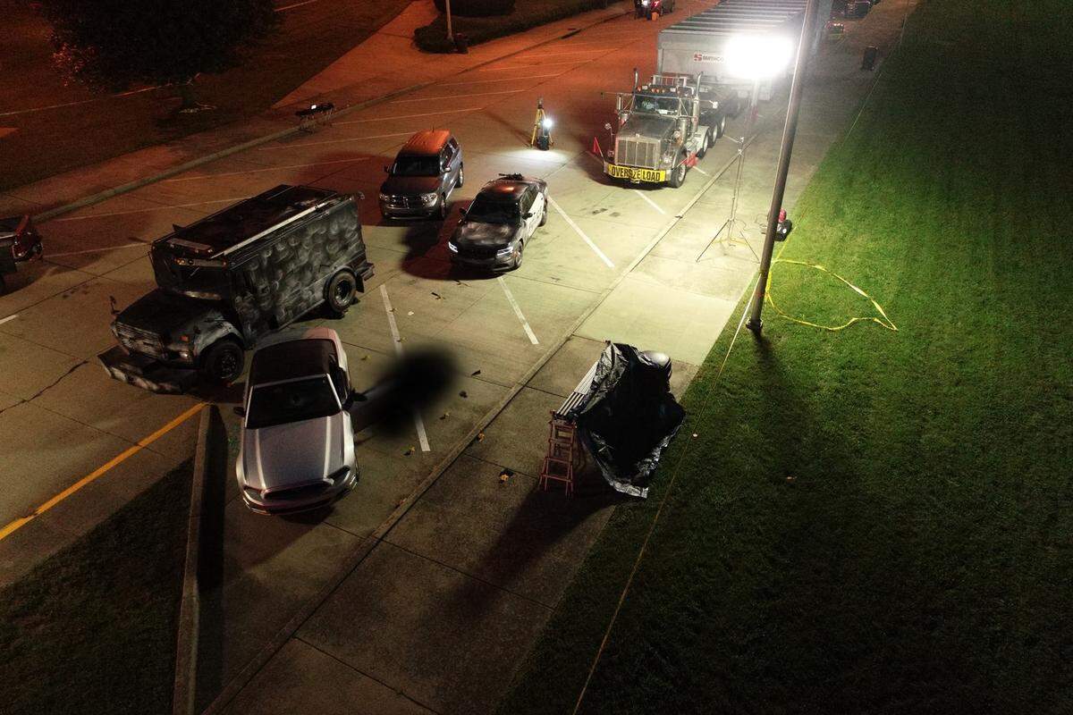 This closeup view included in a Kentucky State Police case file showed where police vehicles were after they responded to the report that fugitive Edward Reynolds was at an I-75 rest area just outside of Georgetown. Reynolds died in a subsequent shooting. The photo has been altered to conceal Reynolds’ body.