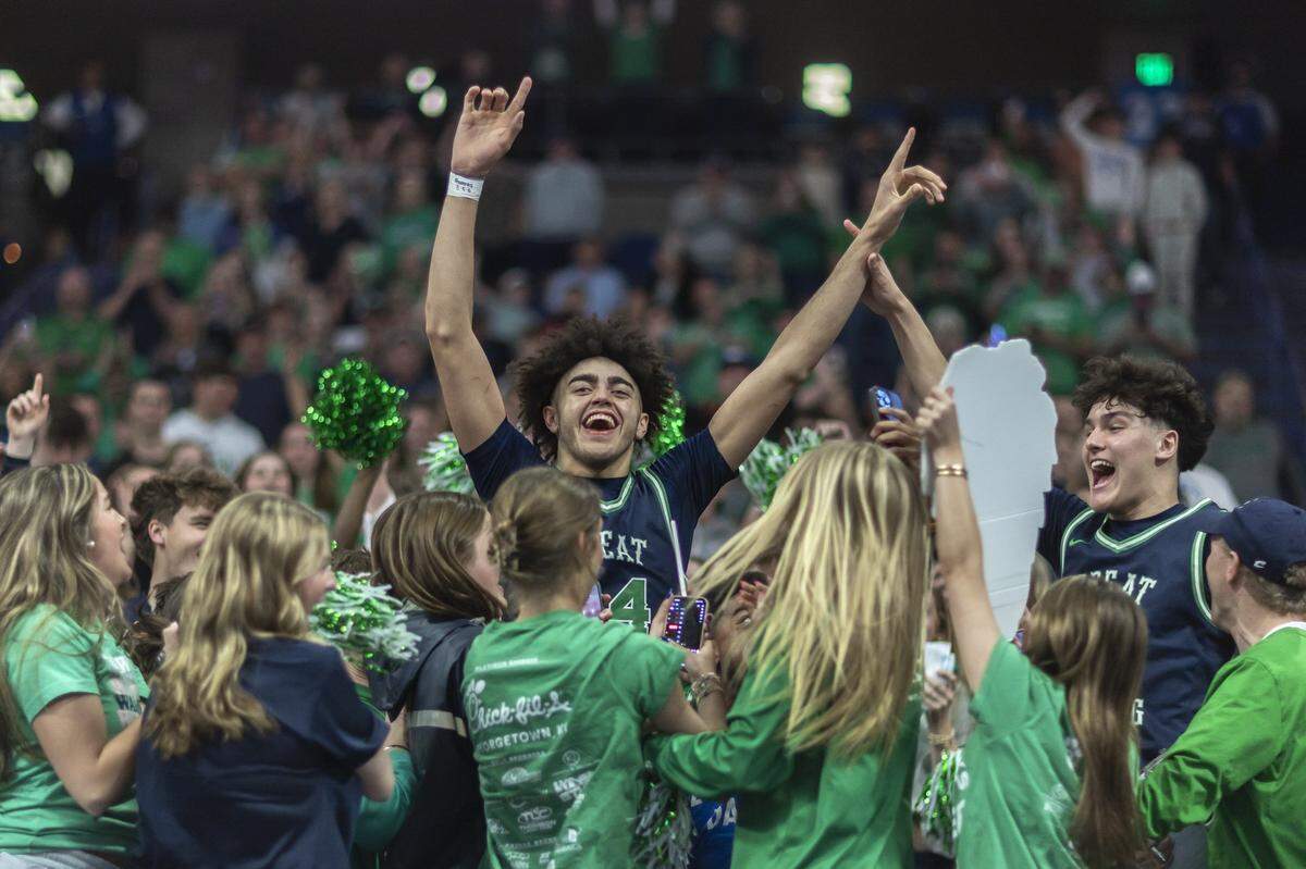 Great Crossing's Malachi Moreno (24) celebrates with the Great Crossing student section following the UK Healthcare Boys’ Basketball Sweet 16 state tournament championship game at Rupp Arena in Lexington on Saturday, March 29, 2025.