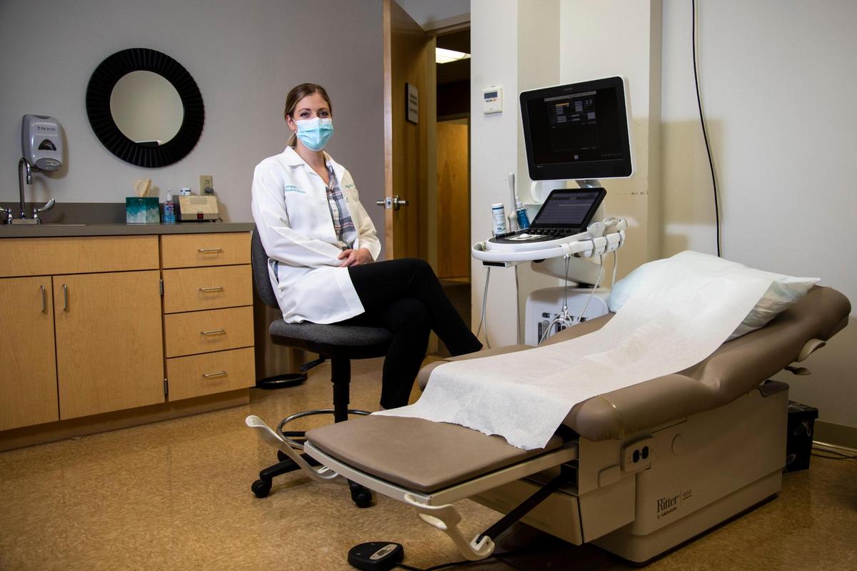 Dr. Sarah Borders, obstetrician and gynecologist, poses for a portrait at Lexington Women’s Health in Lexington, Ky., Tuesday, October 12, 2021. She both delivers babies from moms with covid and has daily conversations with pregnant patients in clinic about the importance of the vaccine.