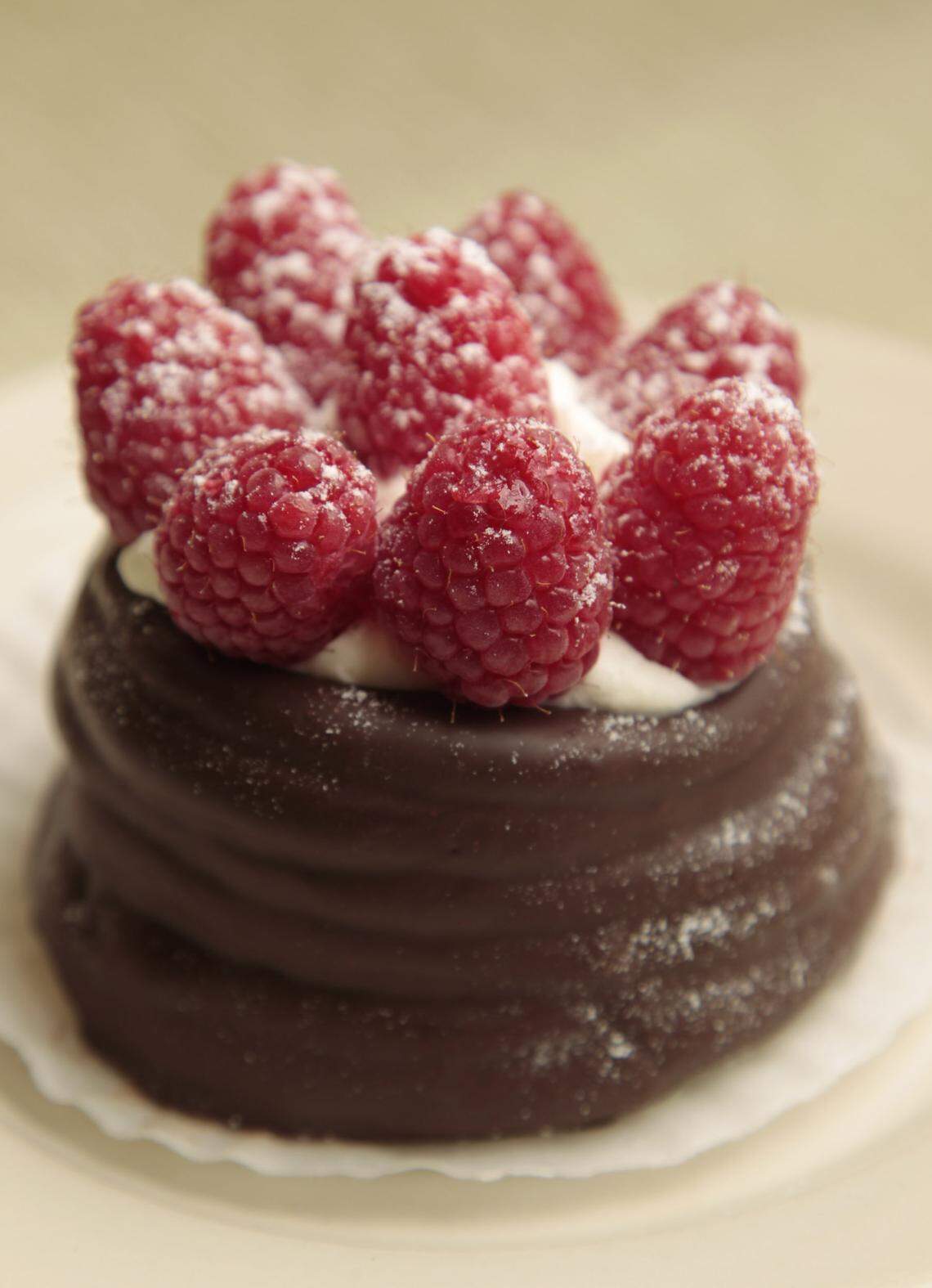 Meringue with lemon chiffon and fresh raspberries, resembling an Easter basket at European Delights Gourmet Bakery in Nicholasville, Ky., on Wednesday April 13, 2011. Photo by Pablo Alcala | Staff 