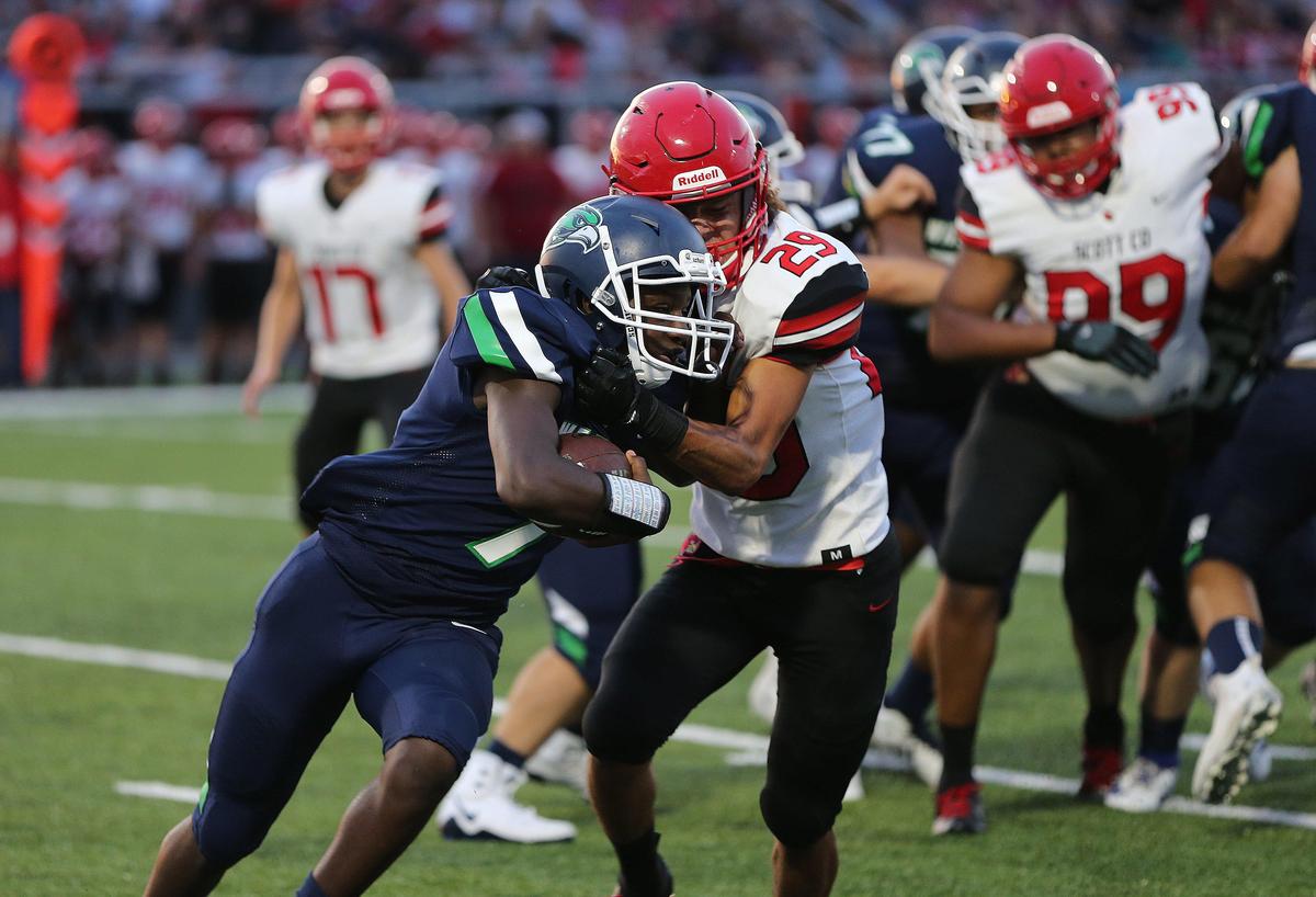 Great Crossing’s Jakeece Patterson ran the ball against Scott County on Friday night.