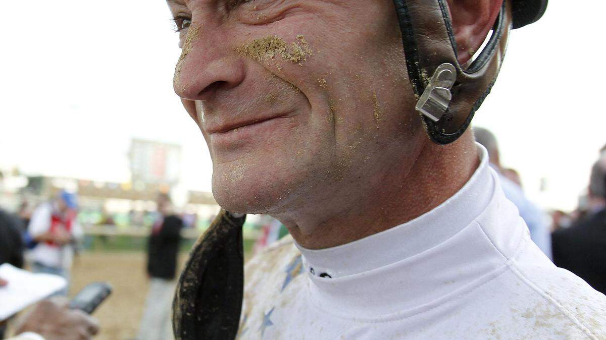 Two-time Kentucky Derby winner Calvin Borel took Ride On Curlin sharply to the rail after breaking from the No. 19 post.