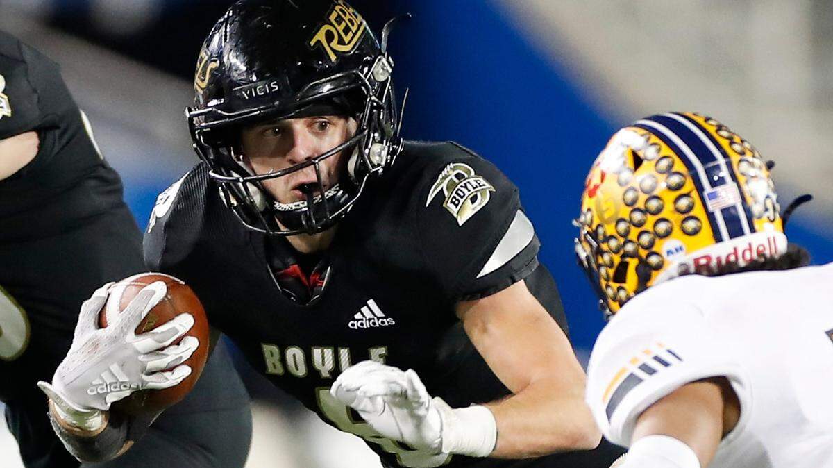 Boyle County’s Cole Lanter (6) ran the ball past Franklin County’s Zach Claudio (7) during the Class 4A 2020 UK Orthopaedic Surgery & Sports Medicine State Football Finals at Kroger Field on Dec. 18, 2020. In Satruday’s season opener, Lanter had three TDs and an interception.