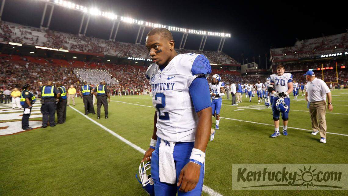 UK's Jalen Whitlow walked off the field after the University of Kentucky lost to South Carolina in Williams-Brice Stadium in Columbia, S.C., Saturday, Oct. 5, 2013. South Carolina defeated Kentucky 35-28. Photo by Charles Bertram | Staff