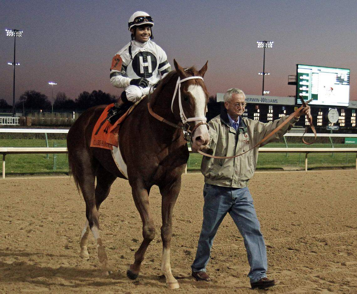 Thoroughbred owner Willis Horton led Will Take Charge and jockey Luis Saez into the winner's circle at Churchill Downs following the colt's victory in the $500,000 Clark Handicap in 2013. Horton is co-owner of Combatant in this year's Kentucky Derby.