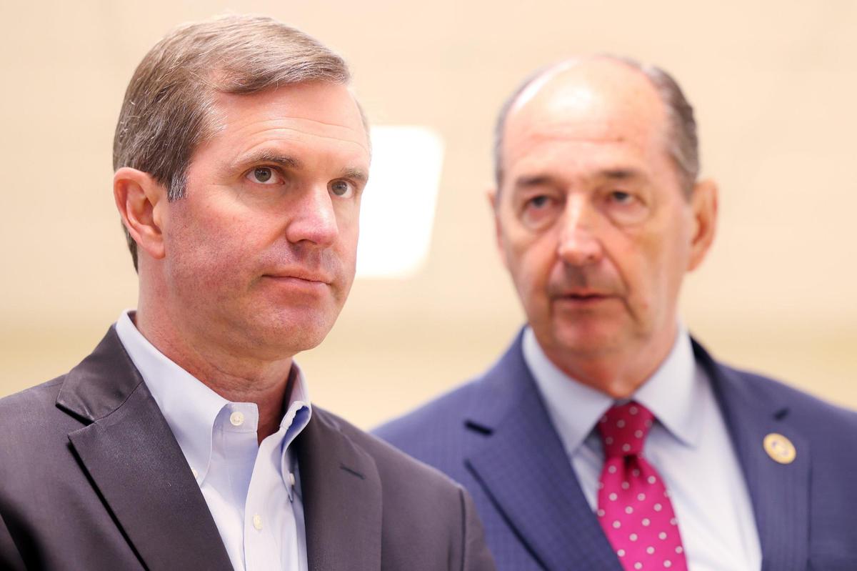 Gov. Andy Beshear, left, listens to Rocky Adkins before speaking about Amendment 2 at Consolidated Baptist Church in Lexington, Ky., Tuesday, Oct. 15, 2024. (Photo by James Crisp)