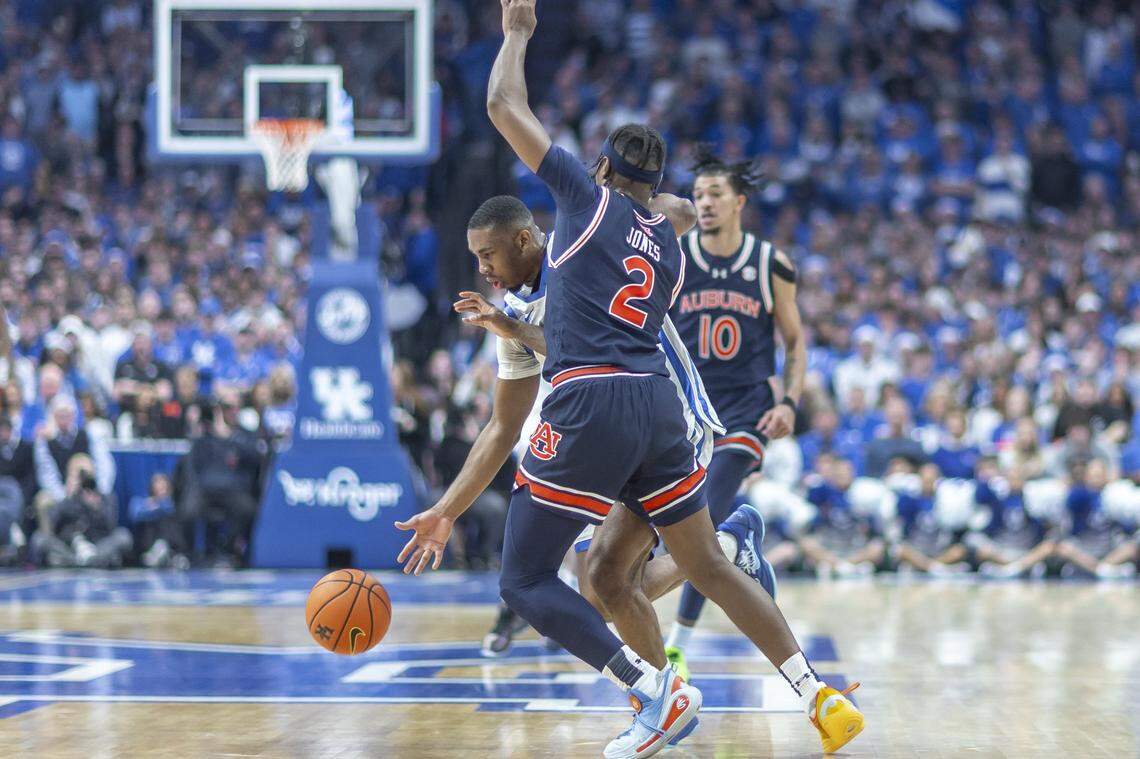Kentucky guard Lamont Butler drives the ball as Auburn guard Denver Jones (2) defends during Saturday’s game at Rupp Arena.