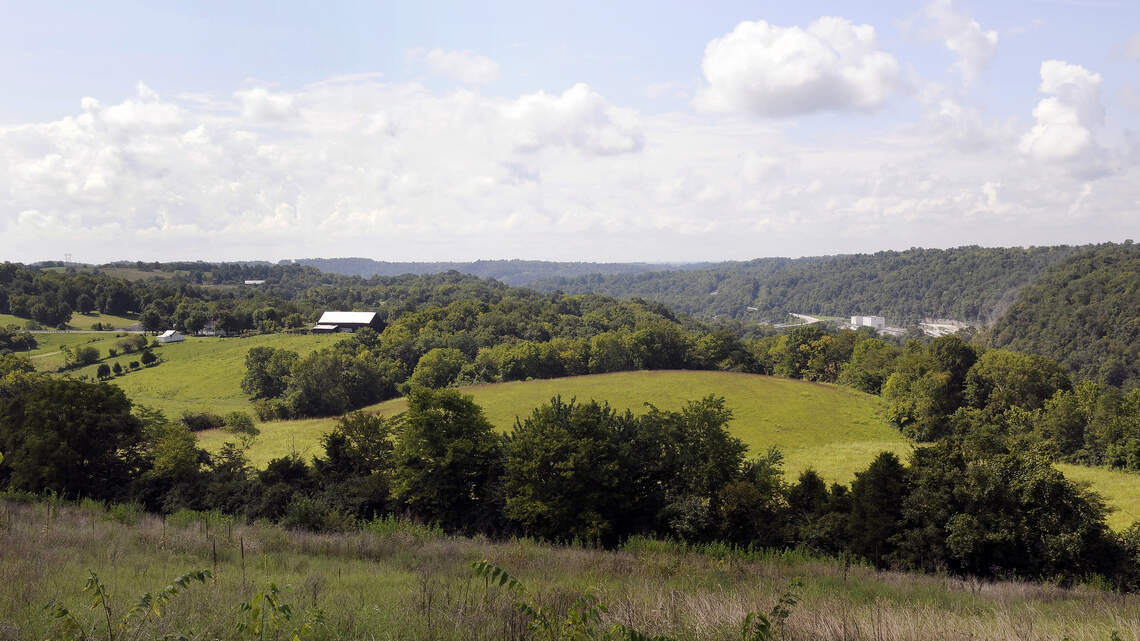 Conveyor belts over the Kentucky River. After 6-year fight, big gravel quarry nears reality.