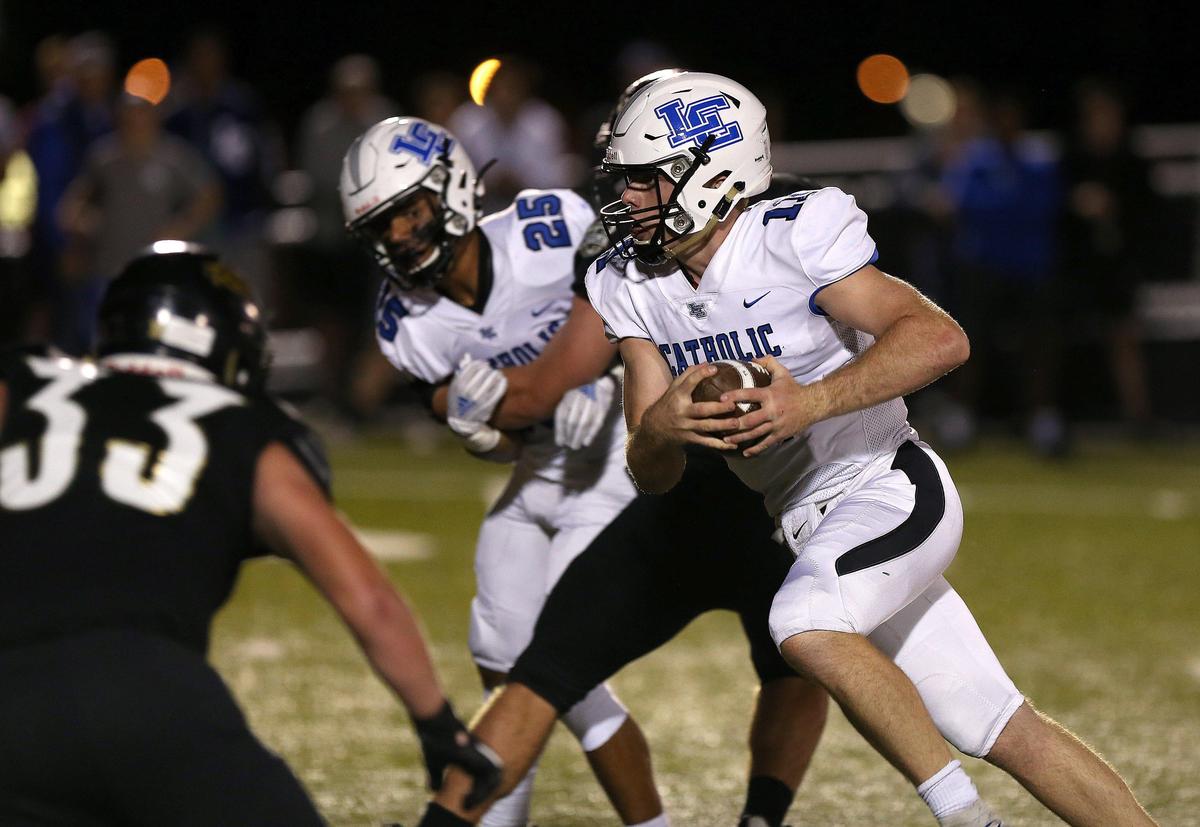 Lexington Catholic quarterback Beau Allen ran on the keeper Friday night against Boyle County. Allen finished with 308 yards passing and two TDs in the air and another on the ground in the loss.