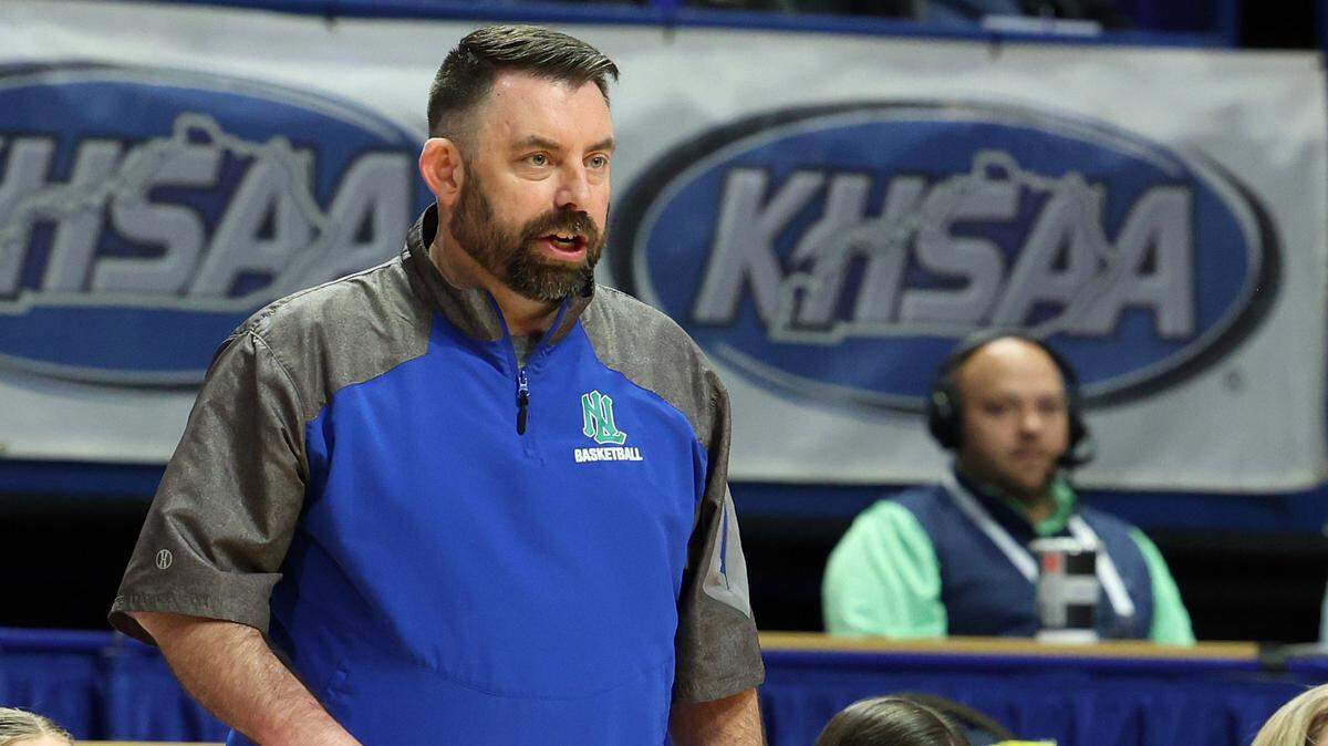 North Laurel head coach Eddie Mahan watches his team during their first round game against Franklin County in the Mingua Beef Jerky Girls' Sweet 16 state basketball tournament at Rupp Arena on March 13, 2024.