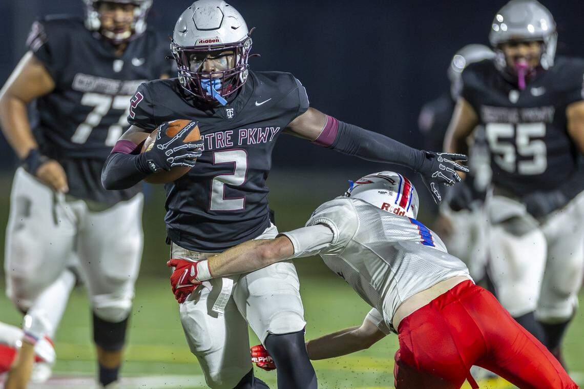 Tates Creek's BJ Evans Jr. (2) runs through the tackle of Madison Central's Jackson Pritchard during their playoff game last season.