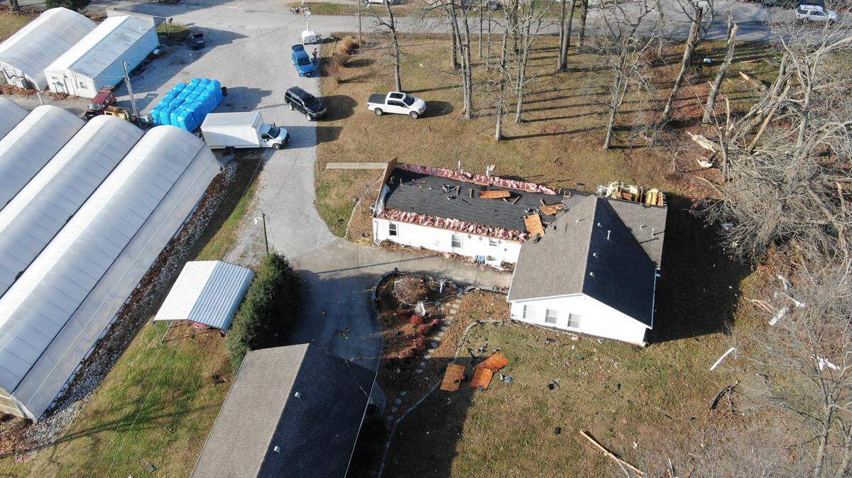 An EF-1 tornado was confirmed in Logan County on the anniversary of historic tornadoes that destroyed parts of Western Kentucky.