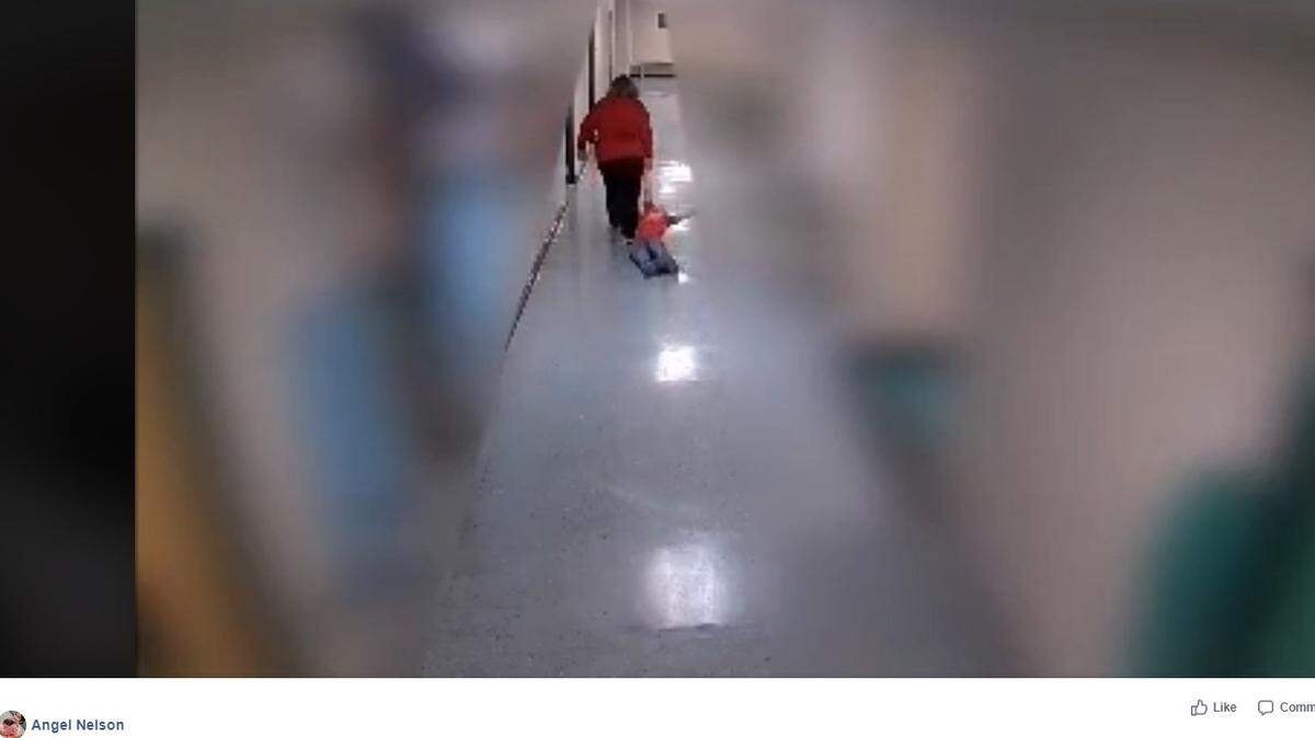 On Facebook, mother Angel Nelson shared a recording of her son being removed from a classroom and dragged down the hallway at at Wurtland Elementary School in the Greenup School District. The footage has been shared on local and national media as news of the incident and the teacher’s punishment spread.