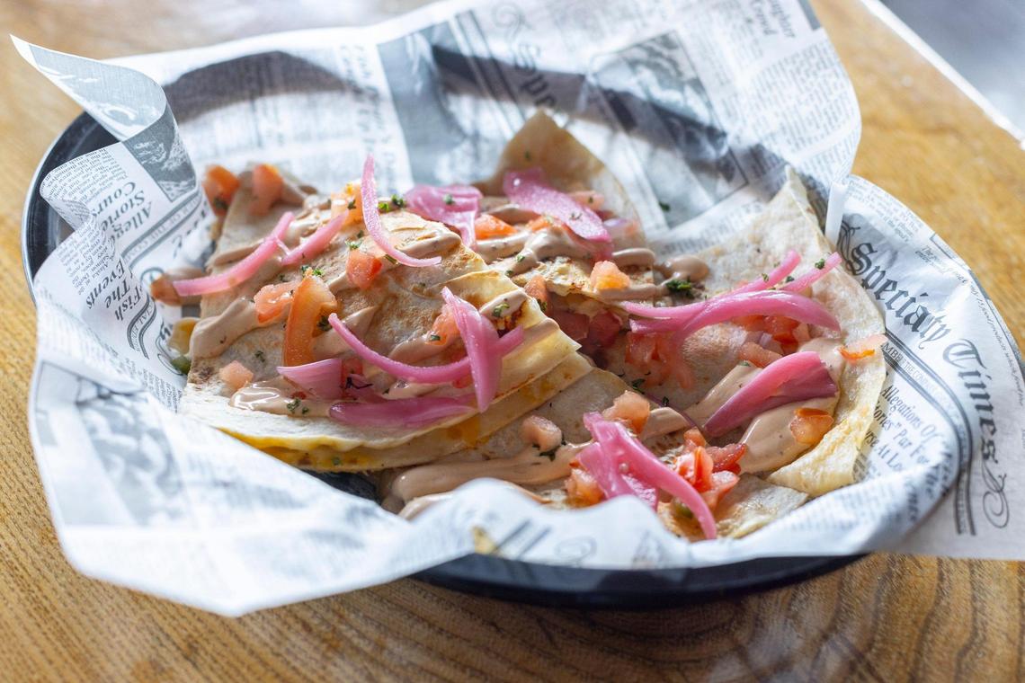A chicken quesadilla with pico de gallo, corn, black beans, cheddar cheese and adobo cream sauce is a popular option at Yearling Kitchen inside Blue Stallion Brewing.