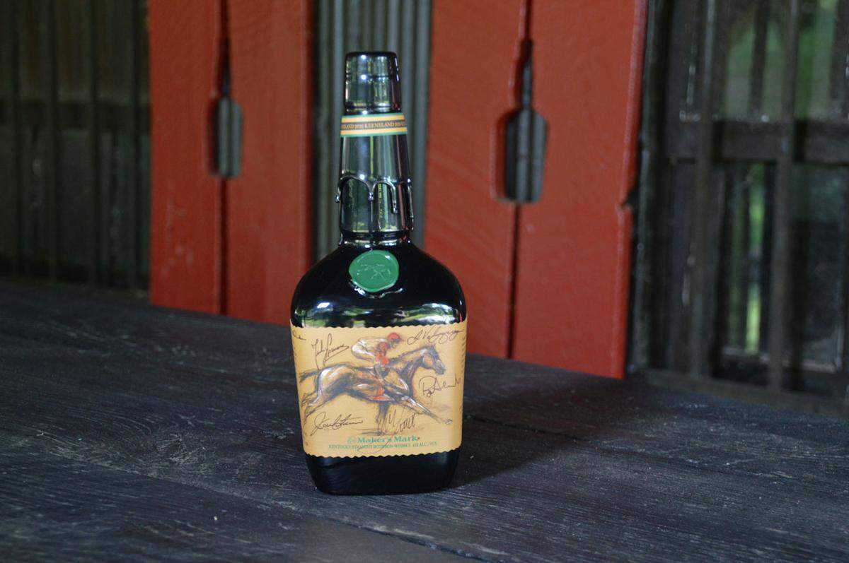 Jockeys John Velazquez, Julien Leparoux and Javier Castellano signed labels, along with Robby Albarado, Mike Smith, Rob Samuels and Bill Thomason, that were then placed on the commemorative bottles.