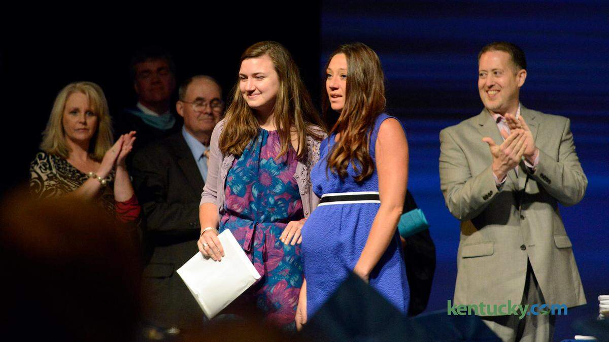 Abigail Morguelan's diploma was received by her boyfriend and sisters after she was placed in a medical coma due to a car wreck earlier in the week at the East Jessamine High School Graduation in Nicholasville, KY on Friday, June 6, 2014. Photo by Katie Decker.