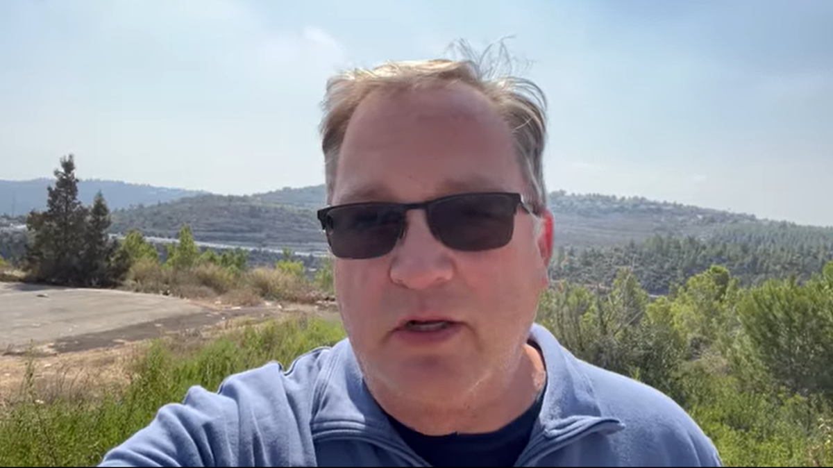 A screenshot from a Facebook video shows Alan Dodson, a former Kentucky Baptist minister, saying that he’s stuck in Israel.