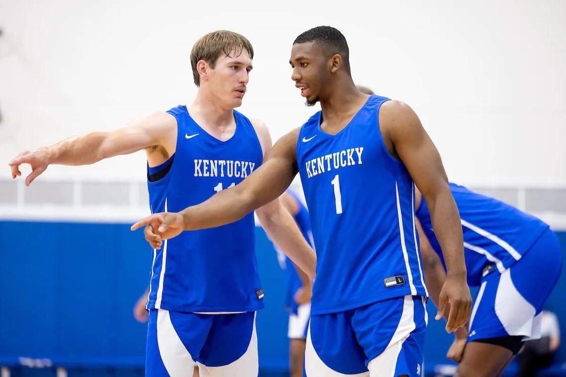 Kentucky senior Lamont Butler, right, talks with freshman Travis Perry during a practice this month.