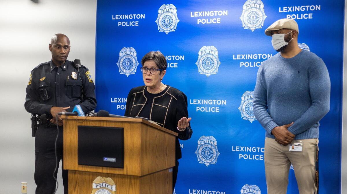 Mayor Linda Gorton, center, joined with Police Chief Lawrence Weathers, left, and One Lexington director Devine Carama, right, to address the record number of annual homicides set in 2021.