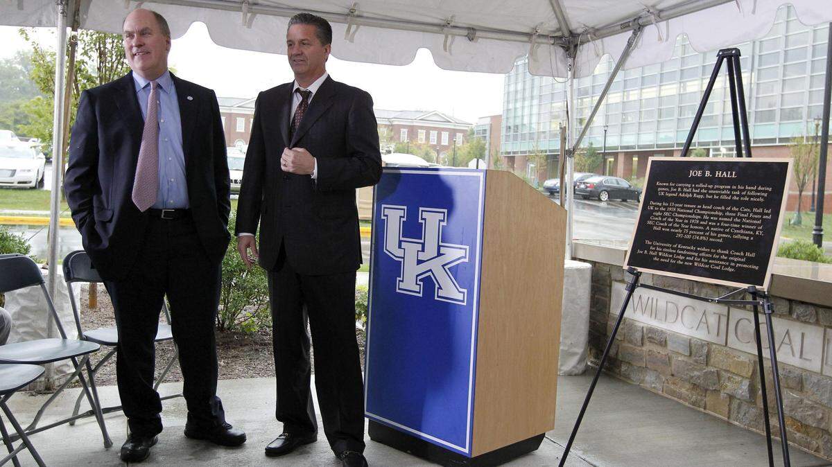 Joe Craft, left, talked with Kentucky Coach John Calipari during the unveiling ceremony for a sculpture of former Kentucky men's basketball coach Joe B. Hall held Sept. 18 at the new Wildcat Coal Lodge on the University of Kentucky campus. Craft was a major contributor for the lodge and commissioned the sculpture.