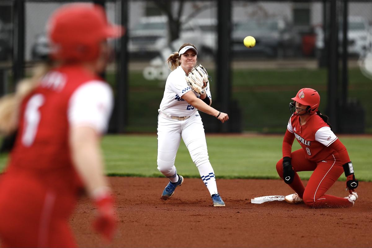 Kentucky junior infielder Emmy Blane attempts to turn a double play against Louisville on Tuesday night at Ulmer Stadium in Louisville.