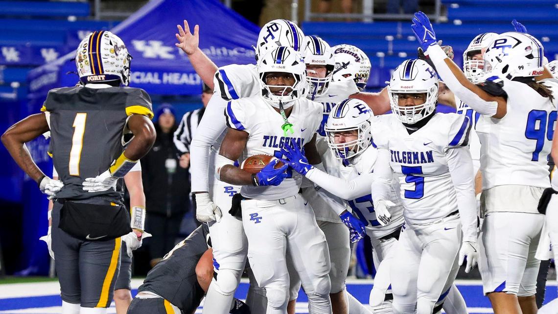 Paducah Tilghman celebrates after Martels Carter (4) scored a first-half touchdown on a 3-yard-run at Kroger Field on Friday night.