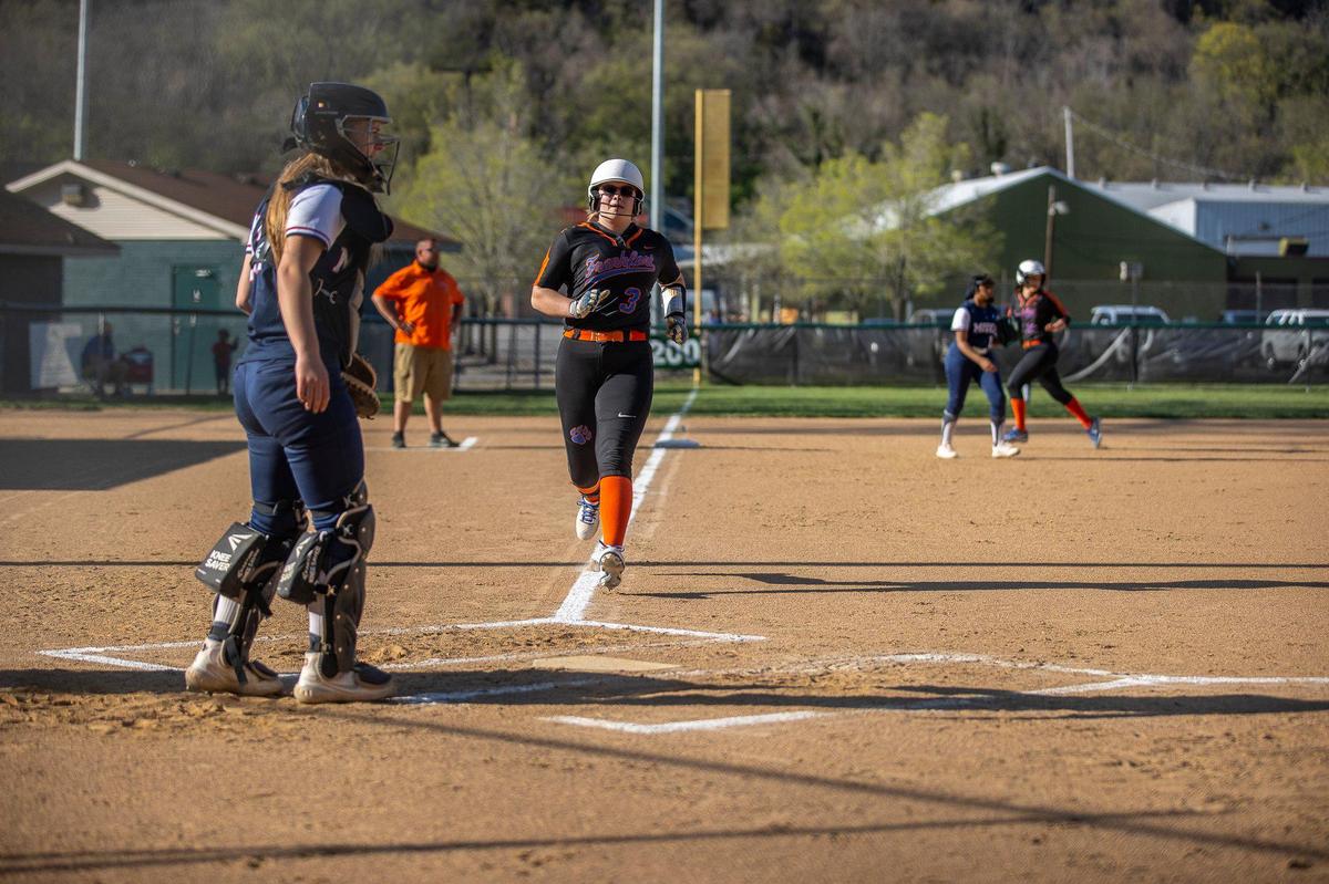 Macy runs toward home plate as she scores a run during Frankfort’s game against Model in Frankfort, Ky., on Friday, April 9, 2021.