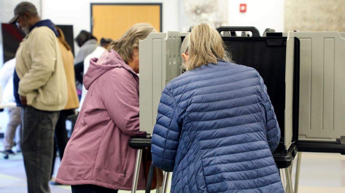 Voters cats their ballots for the 2023 statewide general election during the first day of early voting at the Lexington Senior Center, Thursday, Nov. 2, 2023, in Lexington, Ky.