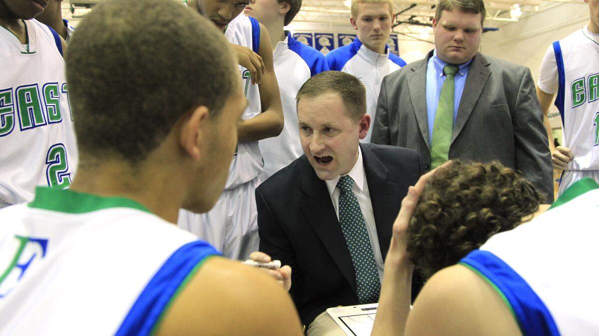 East Jessamine Coach Chris O’Bryan instructed his Jaguars during a timeout in an 89-68 win against Model on Thursday. It was the team’s 13th consecutive victory.