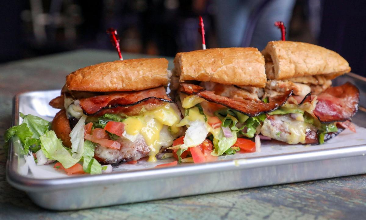 The Cordon Big Blue ($13) with grilled chicken, ham, Swiss cheese, honey mustard, lettuce, tomato and onion at Tilty Bob’s.