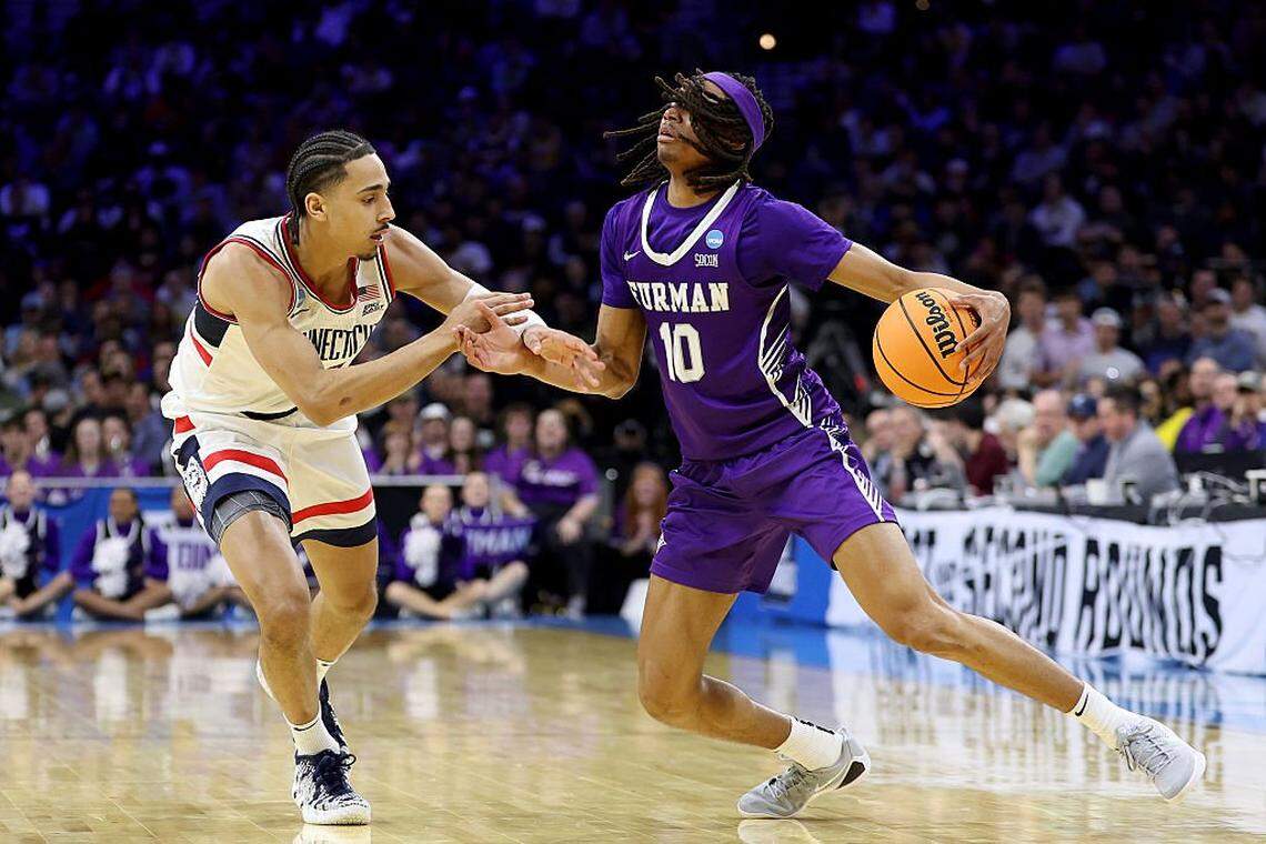 New Kentucky guard Alex Wilkins (10) hit 8 of 15 shots and had 21 points and four assists for Furman in the Paladins’ 82-71 loss to eventual national runner-up Connecticut in the 2026 men’s NCAA Tournament round of 64.