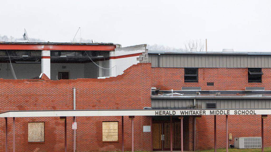 The Hearld Whitaker Middle School in Magoffin County one year after a tornado blew through is unchanged except for the plywood covering the windows.