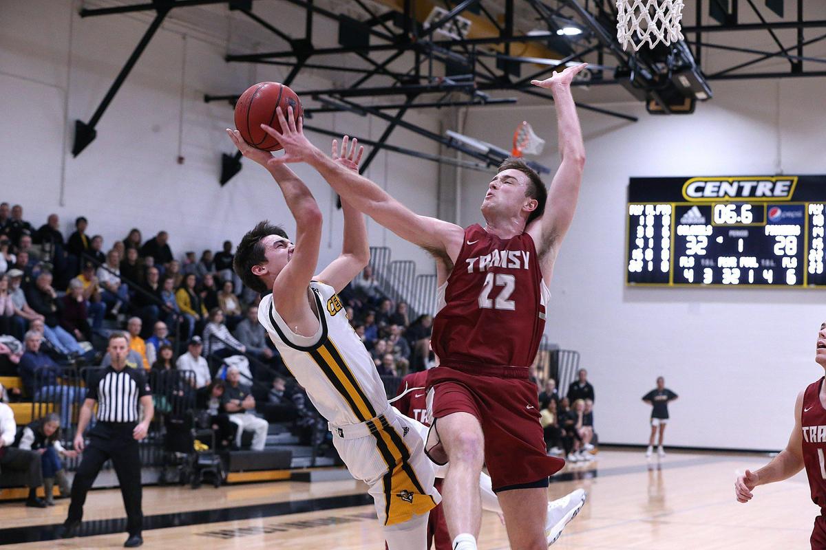 Centre’s Dawson Crump drew a foul Monday against Transylvania’s Lucas Gentry at Alumni Gymnasium in Danville. Centre knocked off the Pioneers, 86-71. Crump scored 16 points in the win.