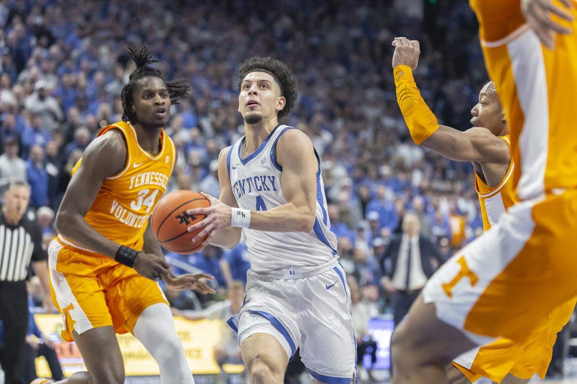 Kentucky guard Koby Brea (4) drives the ball as Tennessee forward Felix Okpara (34) defends during Tuesday’s game at Rupp Arena.