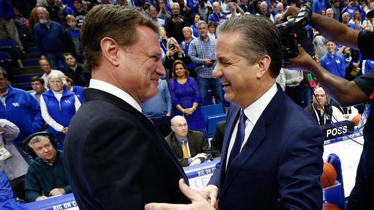 Kansas Coach Bill Self and Kentucky Coach John Calipari talked before Saturday night’s game in Rupp Arena.