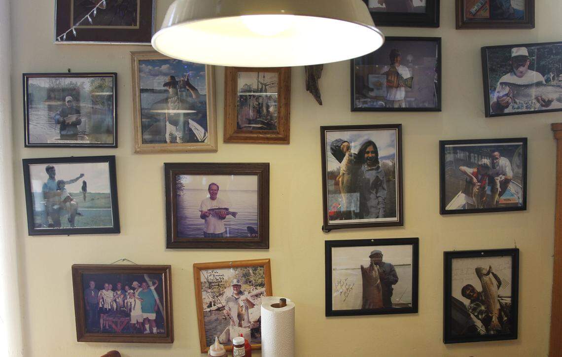 Billy’s Bar-B-Q Wall of Shame fishing photos, May 7, 2013.Billy’s was also known for feeding musicians and its walls were littered with signed artists headshots like B.B. King, Greg Allman, Ray Charles and Waylon Jennings. 