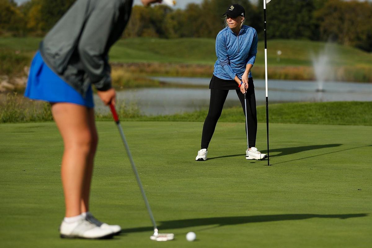 Bryan Station’s Taylor Brennan reacted after putting on No. 17. She finished in a tie for fifth place.