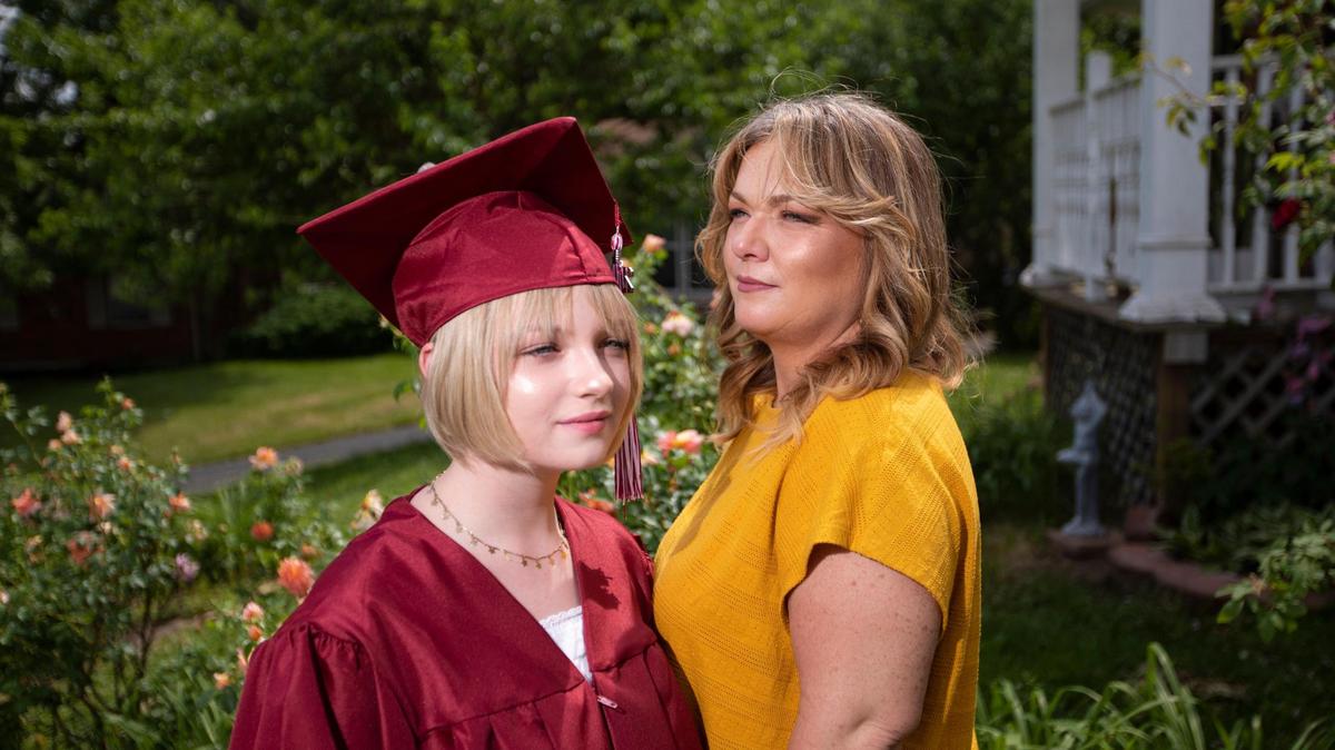 Shyanne Fulks decided to graduate from Tates Creek High School a year early after she moved in with foster mother Aimee Fulks who adopted her during the pandemic in Lexington, Ky., Thursday, May 19, 2022.