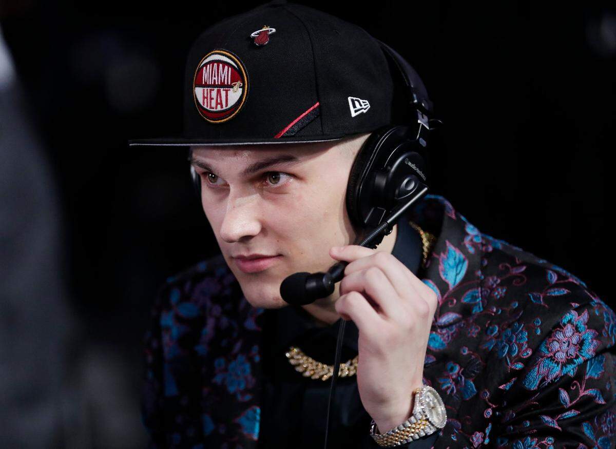 Kentucky’s Tyler Herro adjusts his headset during an interview after the Miami Heat selected him as the 13th pick overall in the 2019 NBA Draft.