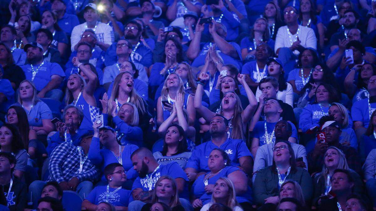 Kentucky fans watched a highlights video before the UK men’s basketball team took the court during Big Blue Madness in Rupp Arena last year.