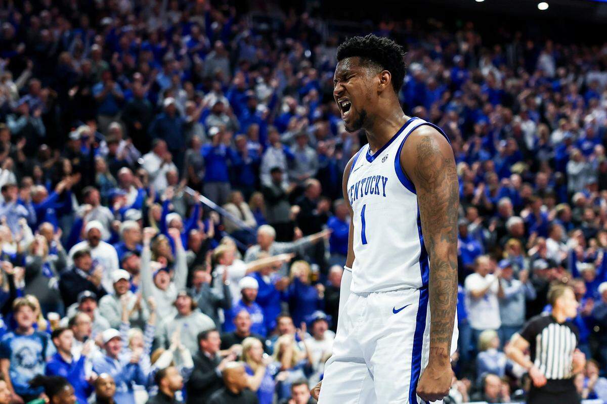 Kentucky’s Justin Edwards celebrates scoring against Miami during Tuesday’s ACC/SEC Challenge game at Rupp Arena.
